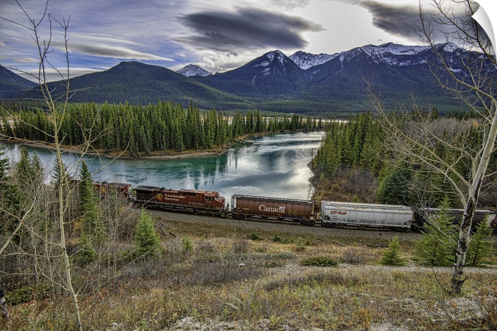 Train along river in Banff, Canada