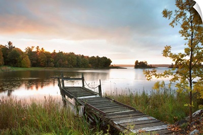 A Dock On A Lake At Sunrise Near Wawa; Ontario, Canada