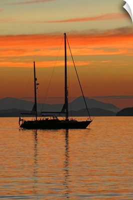 A sailboat is anchored for the night in the Gulf Islands of British Columbia