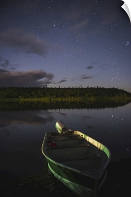 A Skiff Rests On The Banks Of The Kvichak River At Night, Bristol Bay, Alaska