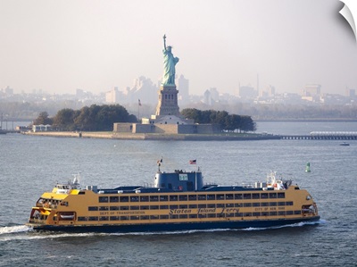 A Staten Island Ferry Passing The Statue Of Liberty