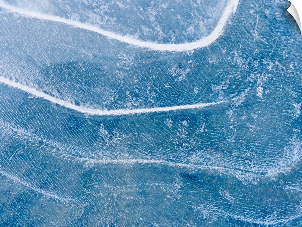 Abstract patterns in the ice during winter along the Tony Knowles coastal trail, anchorage, southcentral Alaska.