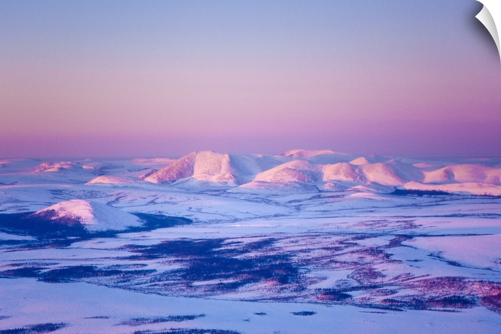 Aerial view of the Noatak River valley and the Baird Mountains just before sunset during Winter, Arctic Alaska