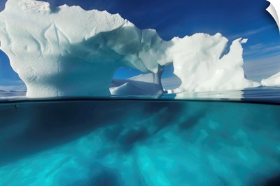 Antarctica, arched Iceberg floating near Enterprise Island