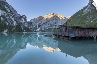 Boathouse With Croda Del Becco Reflected In Braies Lake, Dolomites, Italy