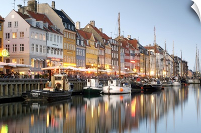 Boats And Townhouses Along The Nyhavn Canal In Copenhagen
