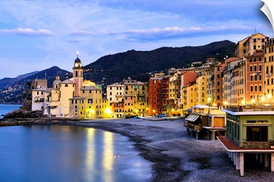 Buildings illuminated by lights along the water's edge, Camogli, Liguria, Italy