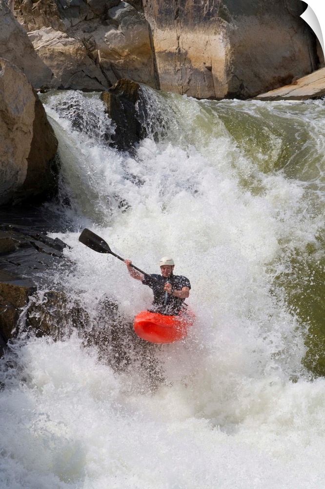 A C-1 paddler goes down the Spout on the Potomac River.