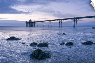Clevedon Pier In The Severn Estuary At Low Tide After Sunset