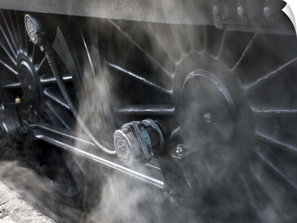 Close-Up Of Steam Engine Train Wheels