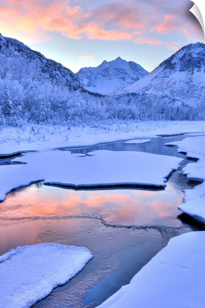 Colorful sunrise over a stream at the Eagle River Nature Center in Chugach State Park, Southcentral Alaska, Winter, HDR