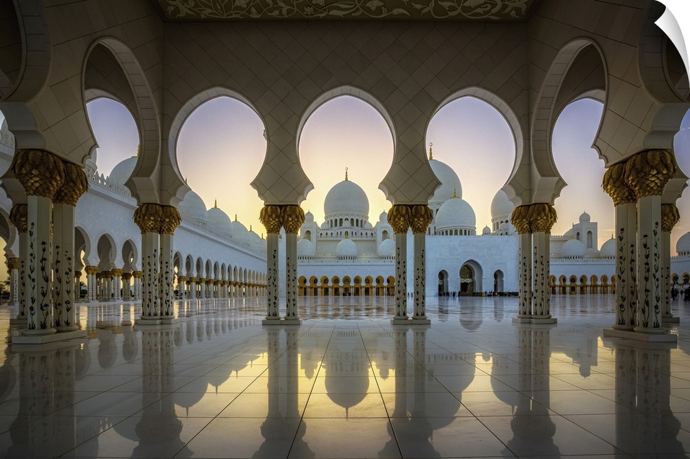 Columns and arches of the Grand Mosques at sunset.