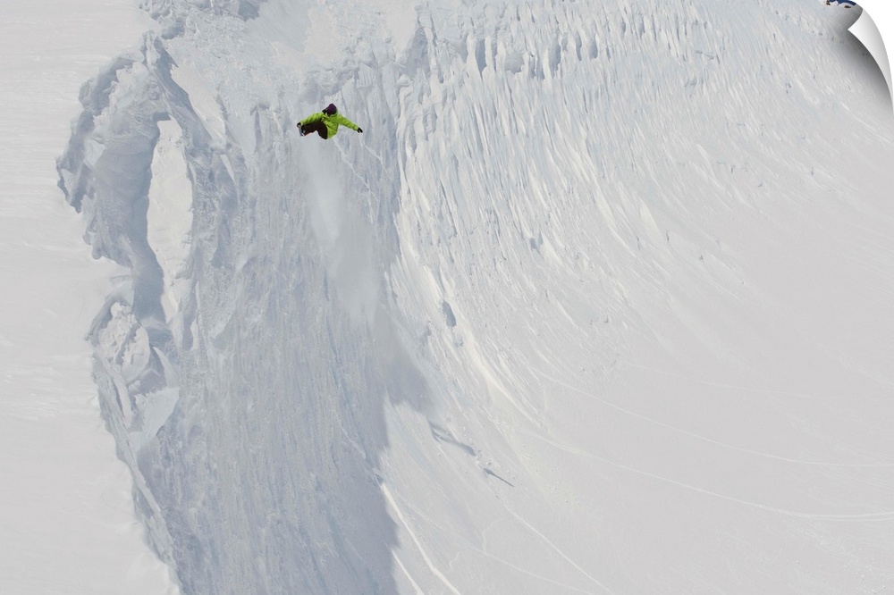 Professional snowboarder, Kevin Pearce, extreme heli boarding in the mountains above Haines, Alaska.
