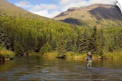Fly Fisherman casting for Dolly Varden Quartz Creek Kenai Peninsula Alaska Fall