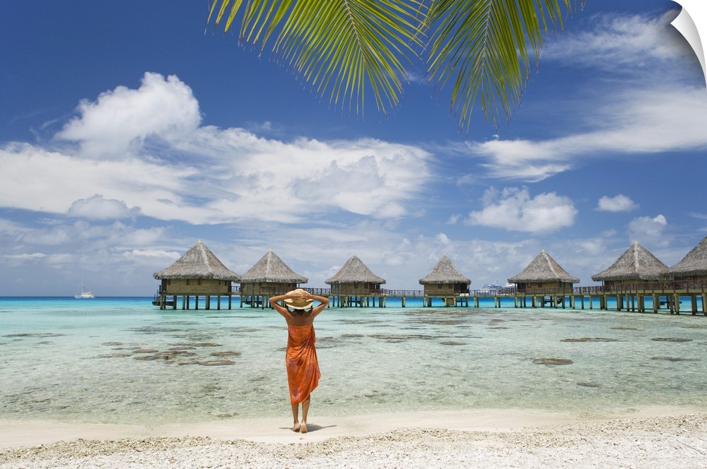 French Polynesia, Tuamotu Islands, Rangiroa Atoll, Woman On Beach Near Luxury Resort