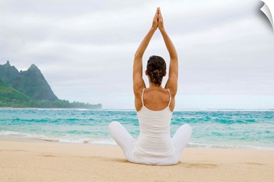 Hawaii, Kauai, Haena Beach, Woman Meditating On Sandy Shore