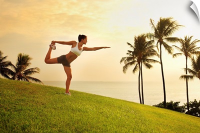 Hawaii, Oahu, Female Doing A Yoga Pose, Stretching On A Hill