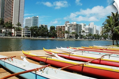 Hawaii, Oahu, Honolulu, Lineup Of Colorful Outrigger Canoes Next To Ala Wai Canal