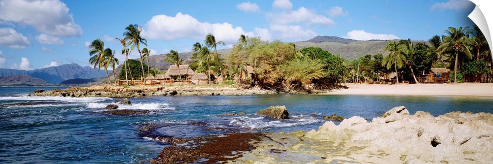 Hawaii, Oahu, Paradise Cove, Thatched Huts Along Shoreline