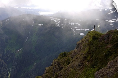 Hiker on Eagle Peak promontory Admiralty Island Tongass National Fores