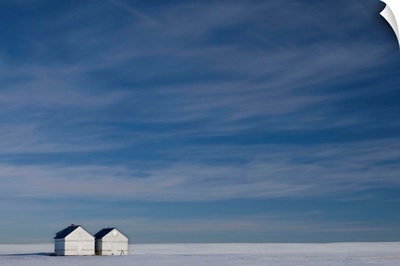 Hussar, Alberta, Canada, Two Small Farm Buildings In Flat Winter Landscape