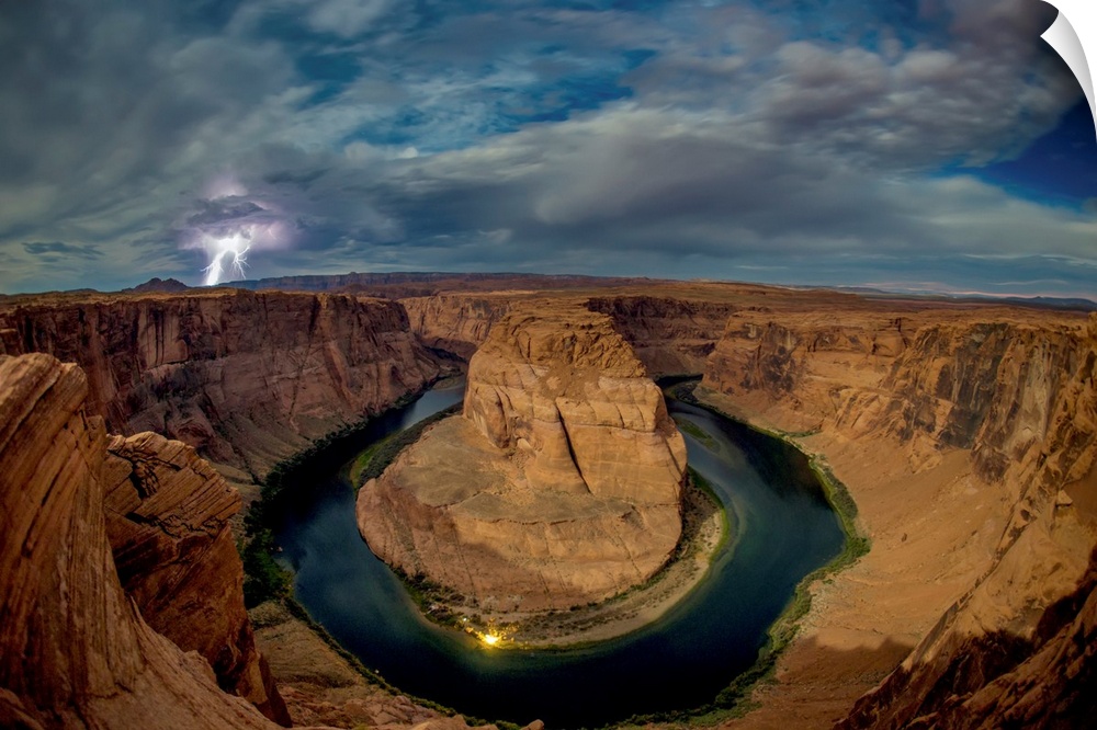 Lightning strikes over the Horseshoe Bend of the Colorado River at night, Page, Arizona, United States of America