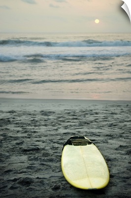 Mexico, Surfboard Lying On Sand