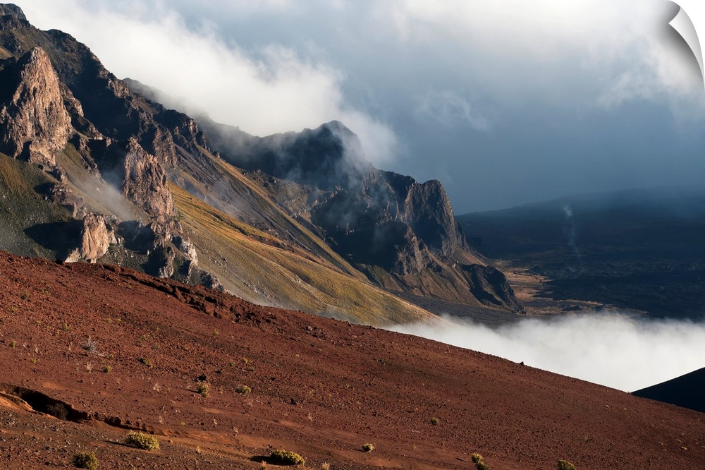 Morning clouds begin to burn off of Haleakala National Park; Maui, Hawaii, United States of America