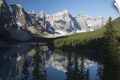 Mountain Range And Lake Reflection With Blue Sky; Alberta, Canada