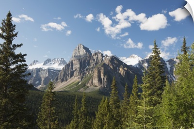 Mountain Vista With Cliff Face And Blue Sky And Clouds; Alberta, Canada