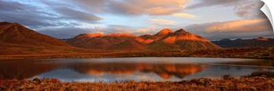 Panoramic Of Sunrise Over Mount Adney Reflected In A Pond In Fall, Yukon, Canada