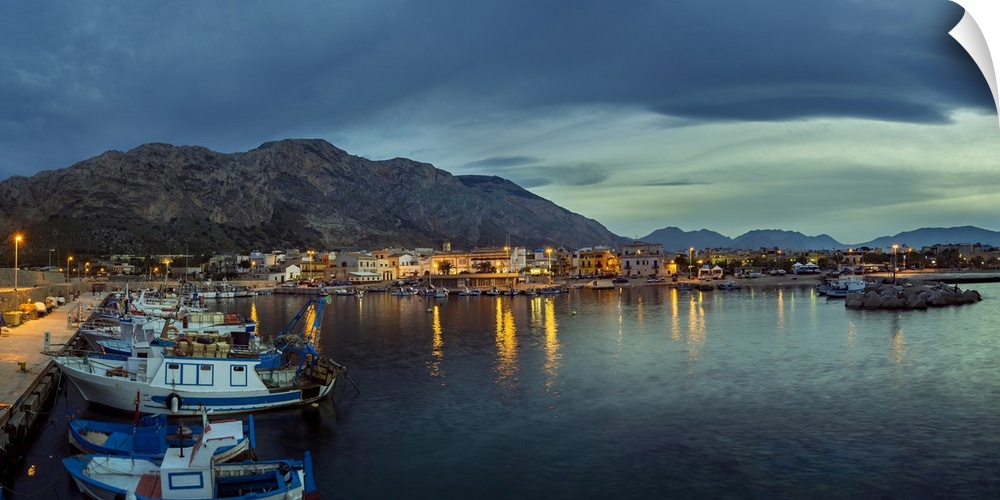 Panoramic view of the harbour at twilight.