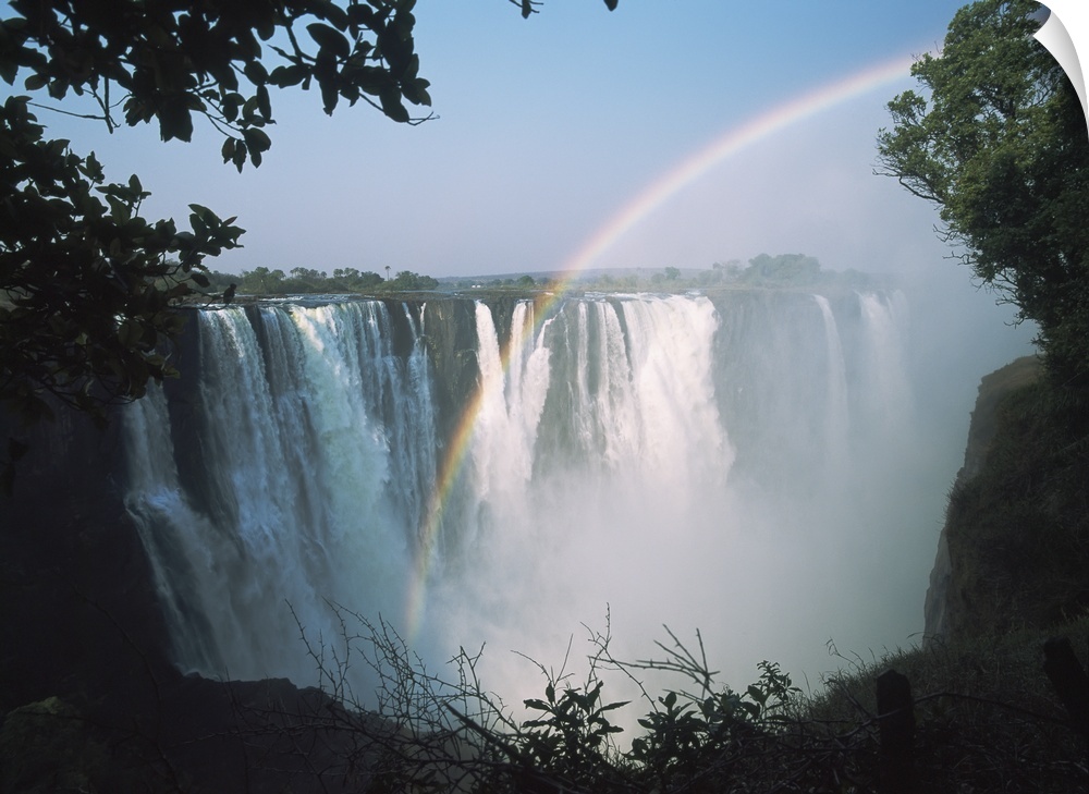 Rainbow In Front Of Victoria Falls; Zimbabwe
