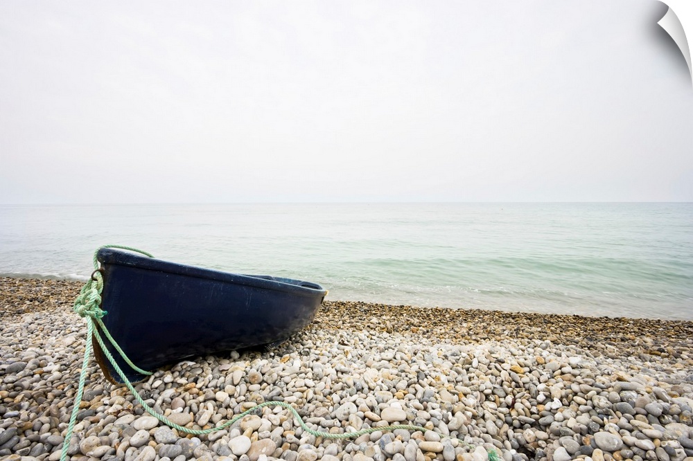 Rowing Boat on Shingle Beach, Devon, England