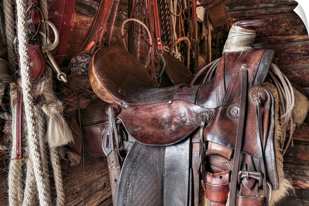 Saddle and horseback riding equipment at Bar U Ranch National Historic Site, Longview, Alberta, Canada.