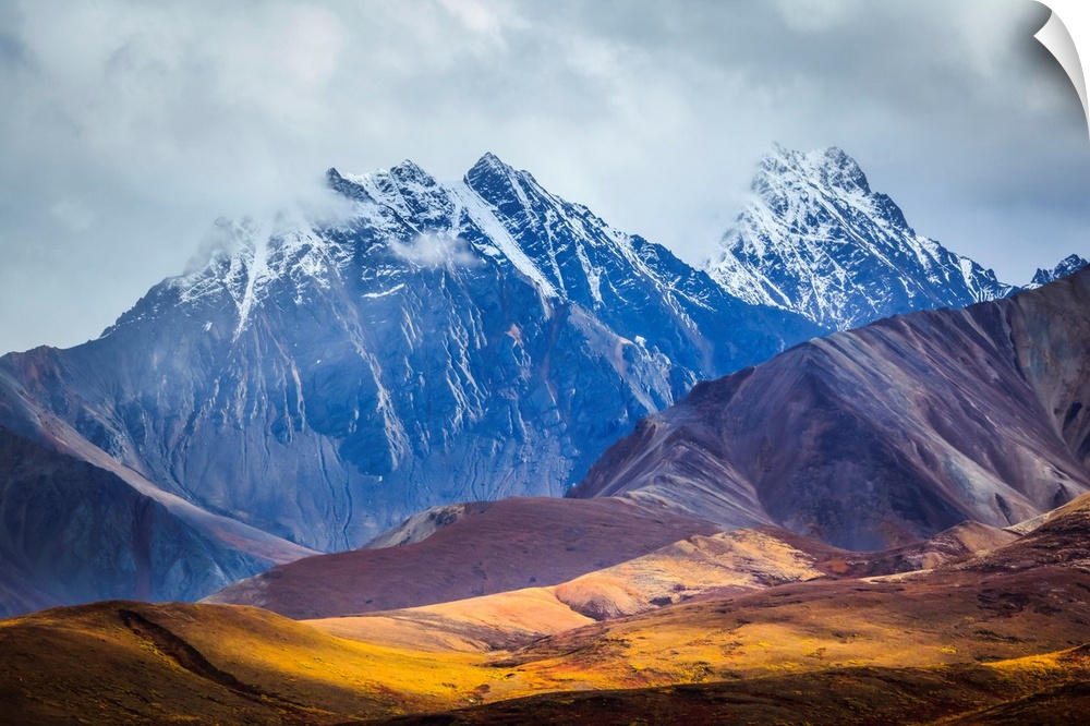 Layers of hills and mountains line Polychrome Pass along the Kantishna Wilderness Trail in Denali National Park. Scenic vi...