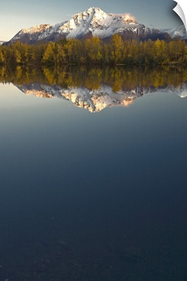 Scenic view of Pioneer Peak reflecting in Echo Lake at sunset Southcentral Alaska