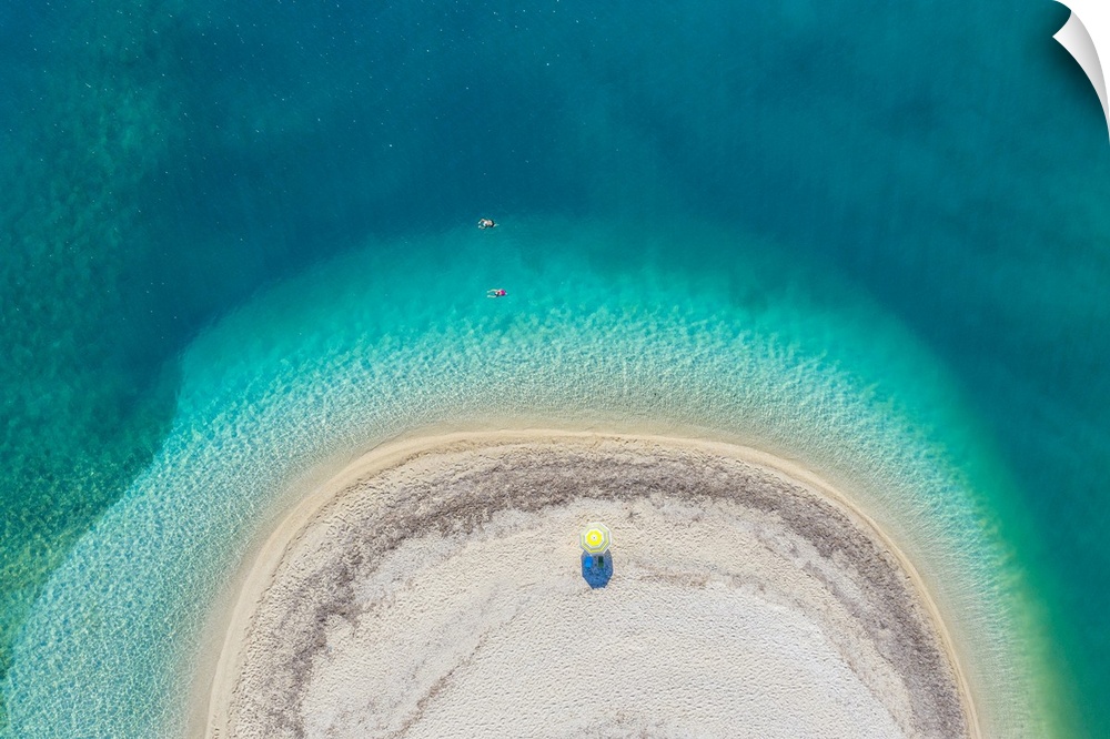 Aerial view of a secluded and spectacular beach with turquoise waters in Lefkada in Greece.