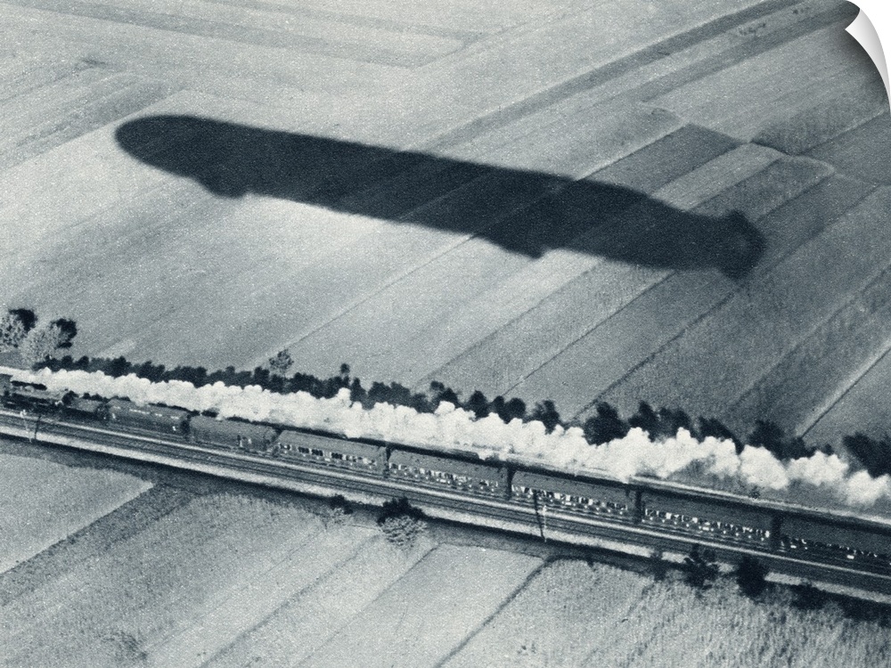 Shadow Of The Fast Zeppelin Air Ship Schwaben Keeping Pace With An Express Train. From The Illustrated War News, 1915.