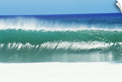 Shimmery Shorebreak Wave With Silver Waters In Foreground