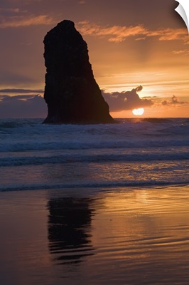 Silhouette Of A Rock Formation At Sunset; Cannon Beach, Oregon, USA