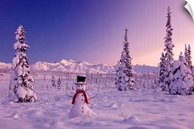 Snowman at sunset, snow covered spruce trees, Chugach Mountains