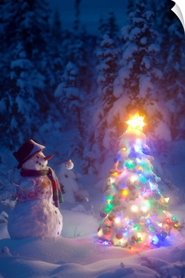 Snowman stands in a snowcovered spruce forest next to a decorated Christmas tree