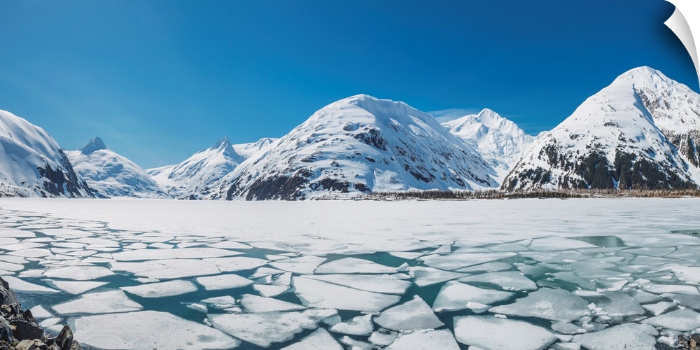 Spring ice breaking apart on the surface of Portage Lake, Chugach mountains, Chugach National Forest, Alaska, USA.