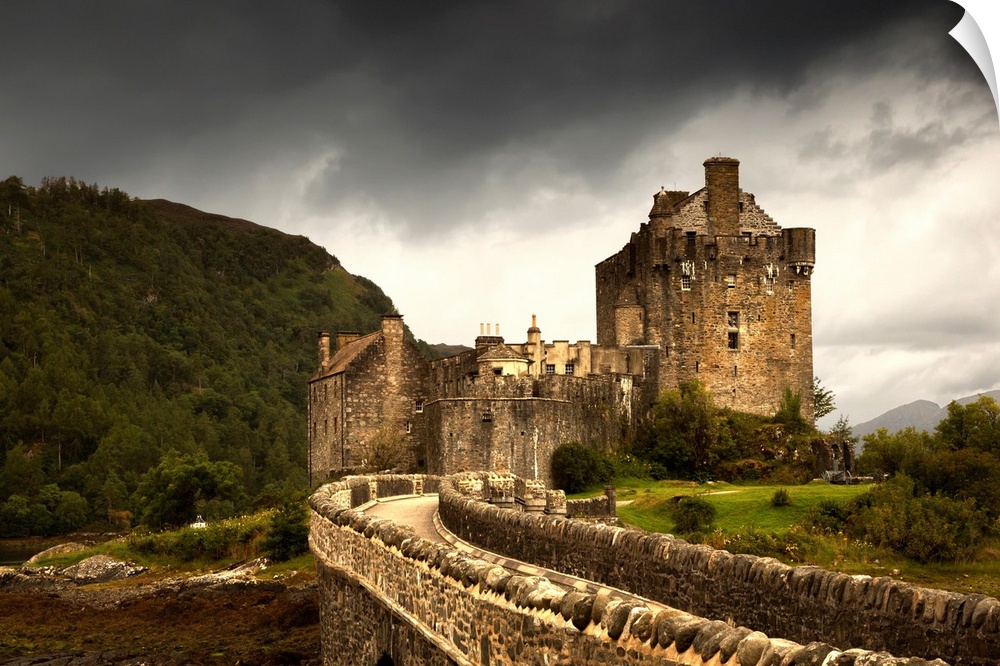 Stone Bridge Leading To A Castle Under A Stormy Sky. Kyle Of Lochalsh Highlands Scotland.