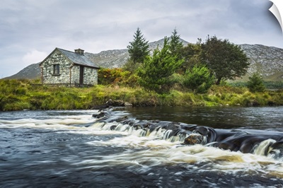 Stone Fisherman's Hut On The Banks Of A Small River, Connemara, County Galway, Ireland