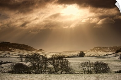 Sun Shining Over Sepia-Toned Winter Landscape, North Yorkshire, England