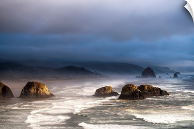 Sunlight and mist create coastal moods, Cannon Beach, Oregon