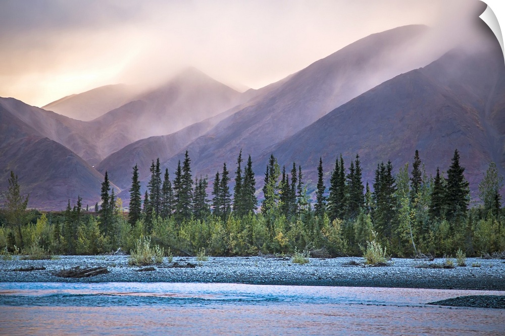 Rain and snow squalls race over the mountains during sunset on the Kelly River, in the western Brooks Range of Noatak Nati...