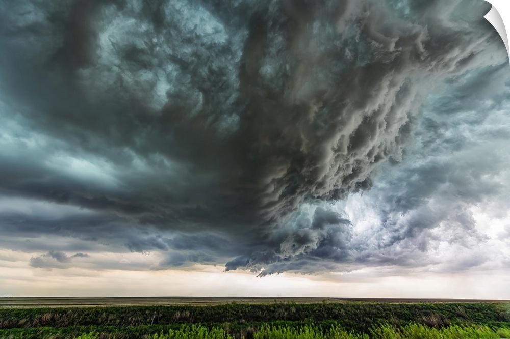 Supercell thunderstorm clouds show off the power of mother nature. Massive clouds build and unleash powerful storms creati...